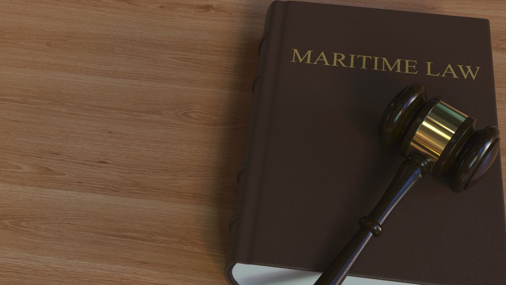 Maritime law book with gavel, symbolizing legal protection provided by a Jones Act lawyer in Louisiana